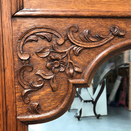 Antique French Oak Louis XV style mantle/trumeau mirror. It has its original mirror and is in good original detailed condition.