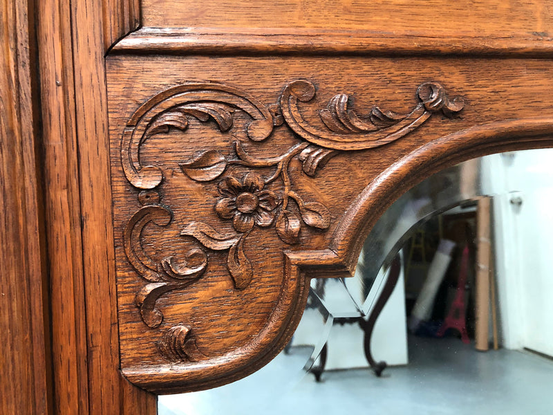 Antique French Oak Louis XV style mantle/trumeau mirror. It has its original mirror and is in good original detailed condition.