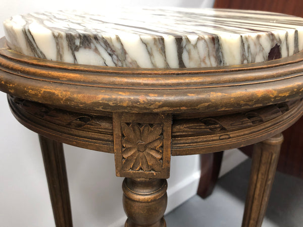 French round two tier marble top gilt wood side table. In good original detailed condition.