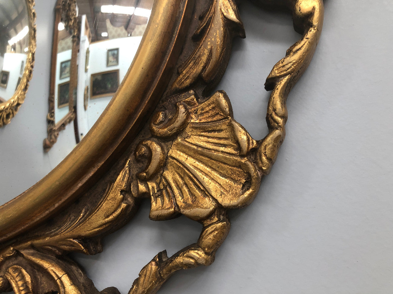 French gilt wood round convex mirror. In good original condition.