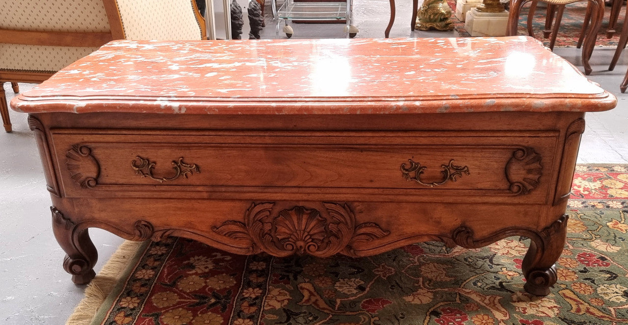 Amazing original walnut Louis XV style coffee table with a marble top, one drawer on either end and a faux drawer at the front. In good original detailed condition, sourced in France.