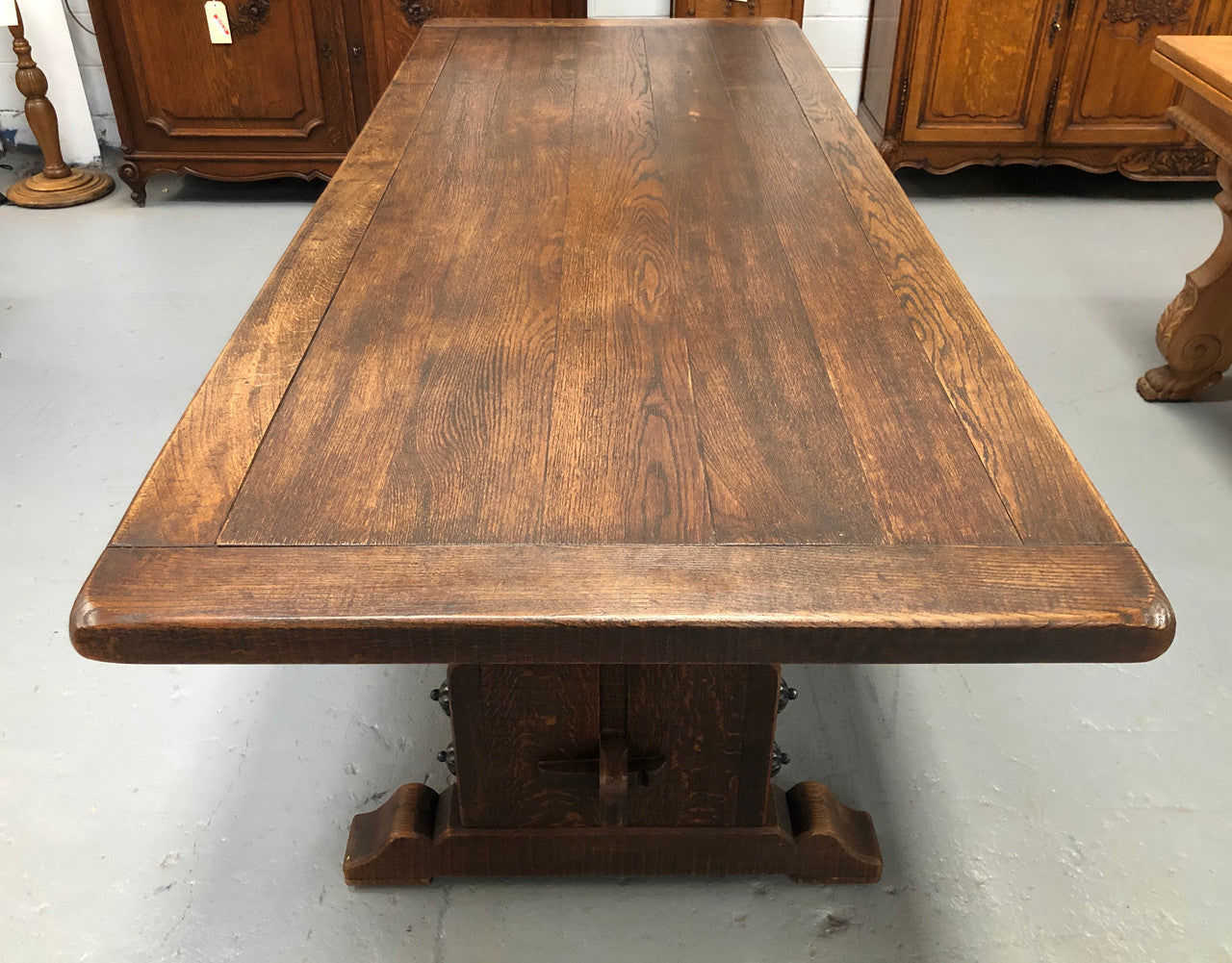 French Oak stretcher base Farmhouse dining table. In good original detailed condition.