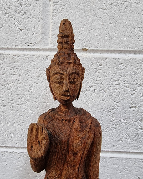 Antique Sukhothai Style Thai carving of a standing Buddha. In good original detailed condition.