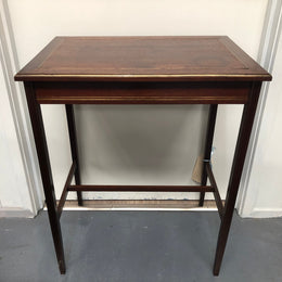 Elegant rectangular mahogany French brass inlaid occasional table. Is in good original condition.