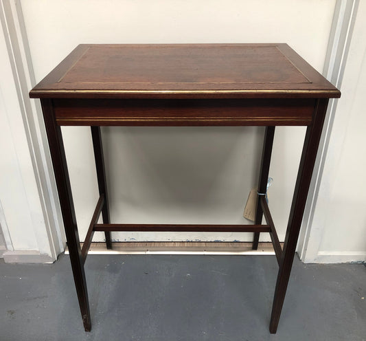 Elegant rectangular mahogany French brass inlaid occasional table. Is in good original condition.