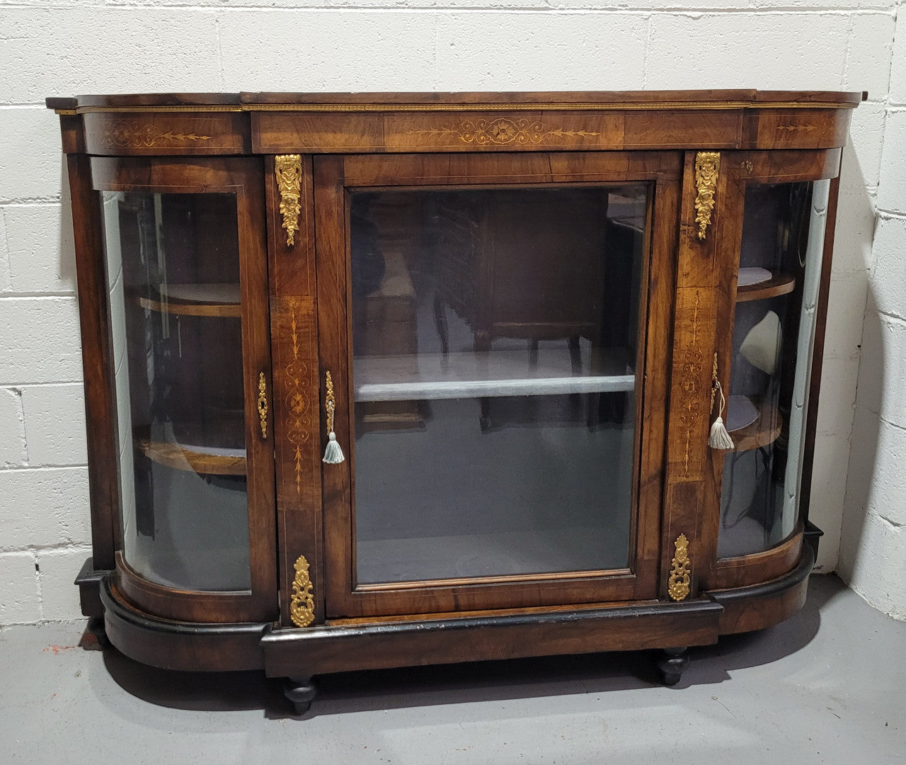 Victorian Rosewood inlaid side cabinet/credenza with velvet lined shelves and gilt mounts. It has been sourced locally and is in good original condition with loads of character.