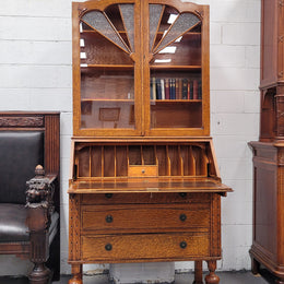 Stunning Art Deco secretary desk bookcase with heaps of storage space. It has a leathered writing area, bookcase with three adjustable shelves and three large drawers at the bottom. It has been sourced locally and in good original detailed condition.