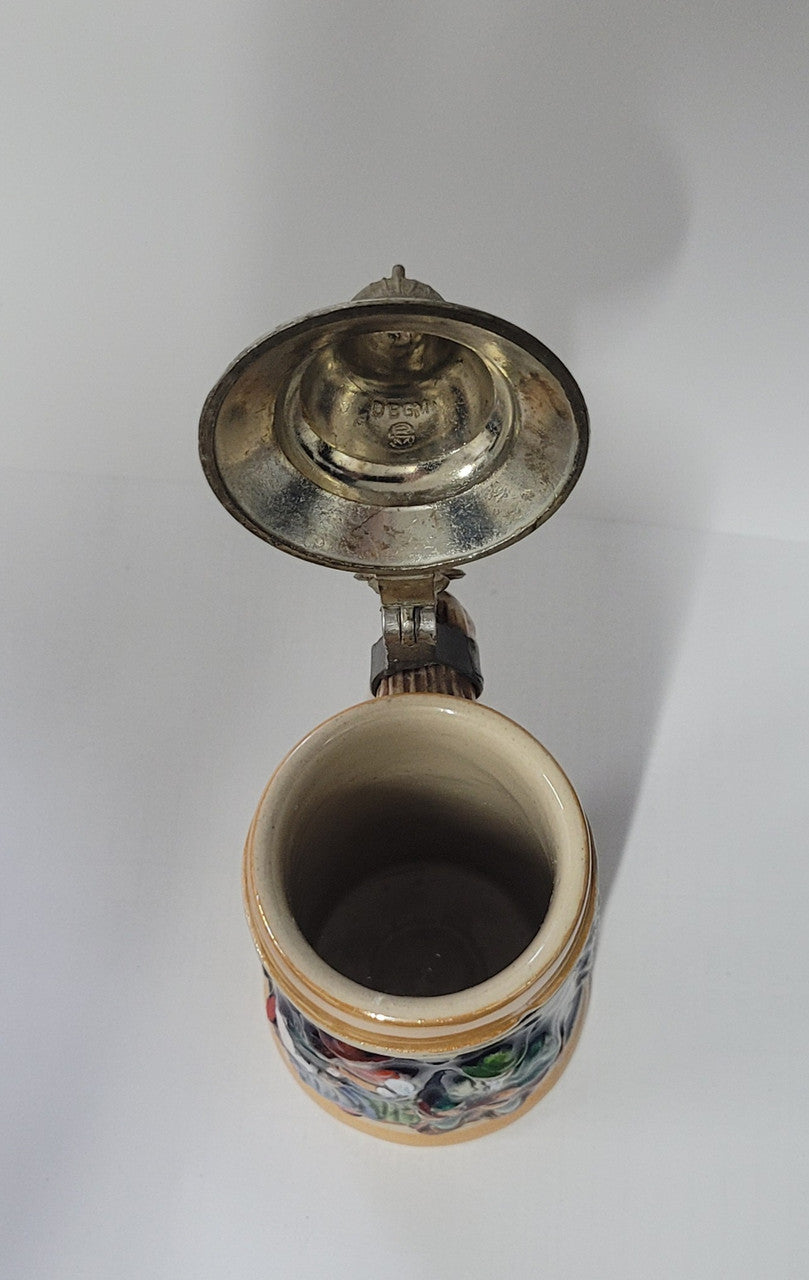 Small Vintage German beer stein marked made in the federal republic of Germany underneath. It is in good original condition, please view photos as they help form part of the description.