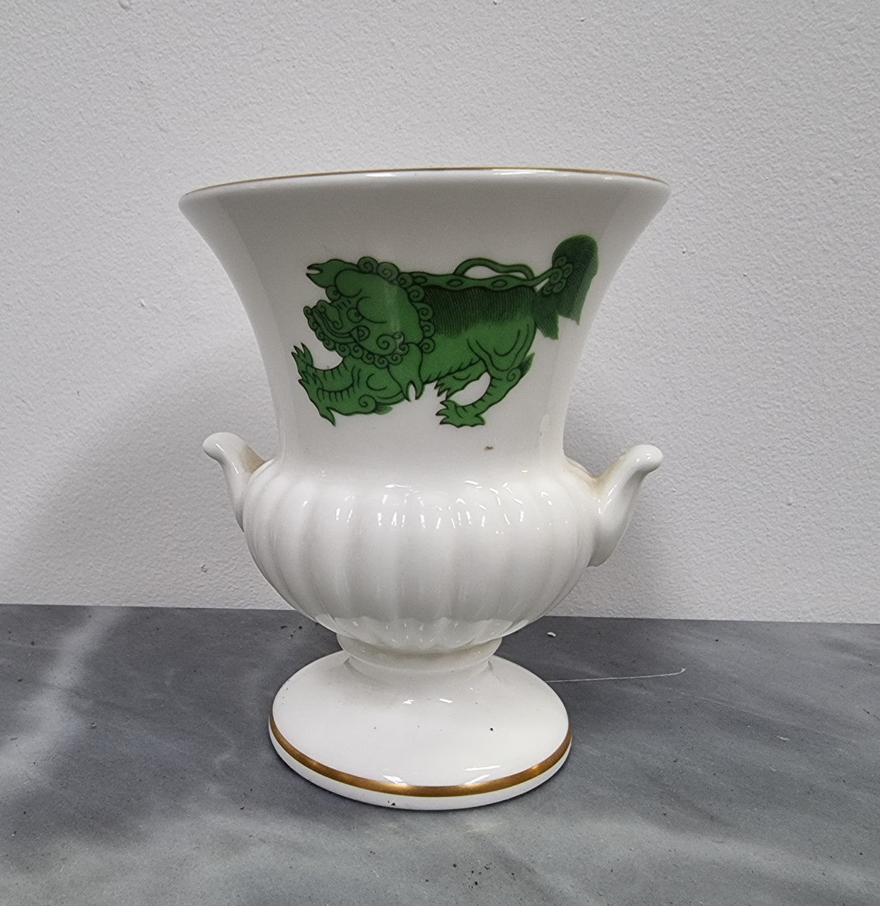 Wedgwood small urn vase with a dragon pattern and gold trim, in great original condition.