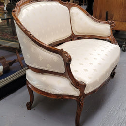 Pretty French Louis XV style small Walnut settee with very good upholstery. Sourced from France and in good original condition, please view photos of the upholstery as it helps form part of the description.