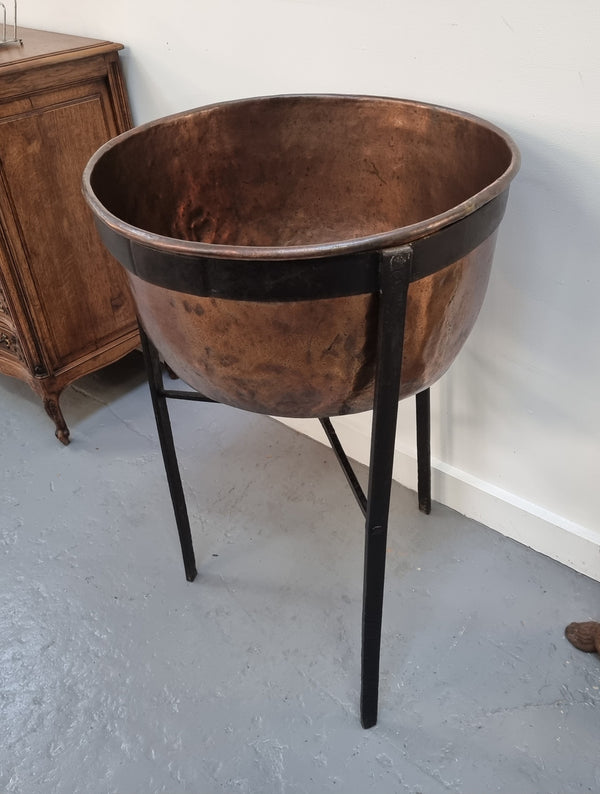 Fabulous Antique French copper pot on a solid iron stand in good original detailed condition. see photo for full description of condition.