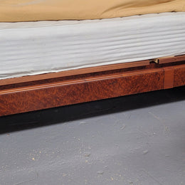 French Art Deco bedroom suite consisting of queen size bed in Amboyna wood and featuring pretty inlay. It comes with a matching pair of bedsides. It is a very stylish and high quality suite. It has been sourced from France and is in good original detailed condition.