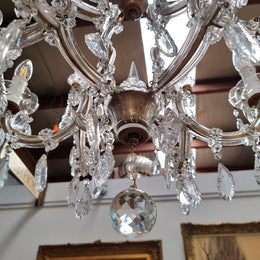Sourced From France an attractive eight arm French crystal chandelier. It has been fully rewired to Australian standards and is in good original working condition.