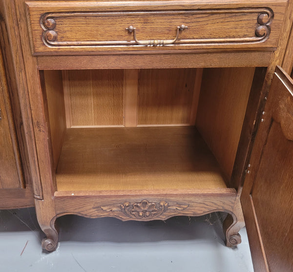 French Oak Louis XV style three door, two drawer, parquetry top sideboard. It has been sourced from France and is in good restored condition.