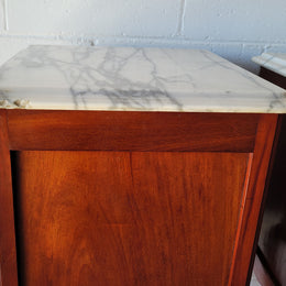 Pair of Louis XV style Walnut bedside cabinets marble top. Circa 1900 and in good original detailed condition.