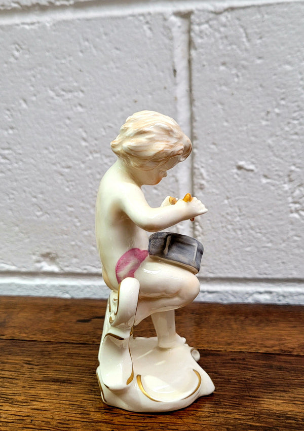 Vintage Goebel cherub drummer boy numbered on base 12 010 17 “Goebel W. Germany” In good original condition, please view photos as they help form part of the description.