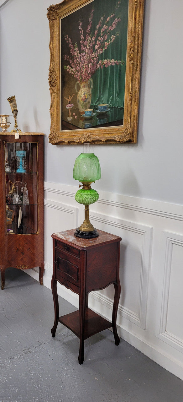 French Rosewood inset marble top single bedside cabinet with one drawer and one cupboard on elegant legs. Would also make a practical and stunning table lamp. It is in good original detailed condition.