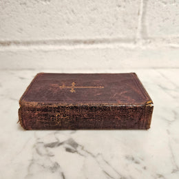 Very small antique leather bound Key of Heaven Manual of Prayer Book printed by M H Gill & Son Dublin. Condition commensurate with age.