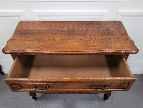 French Louis XV style Oak three drawer chest with wooden top. It has been sourced from France and is in good original detailed condition.