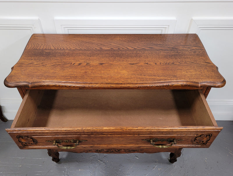 French Louis XV style Oak three drawer chest with wooden top. It has been sourced from France and is in good original detailed condition.