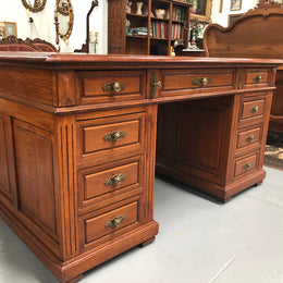 Antique french oak partners desk with plenty of drawers and cupboards and has an inbuilt Chubb Safe with keys. In very good condition.