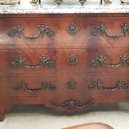 A Grand French Louis XV Style Flame Mahogany Commode