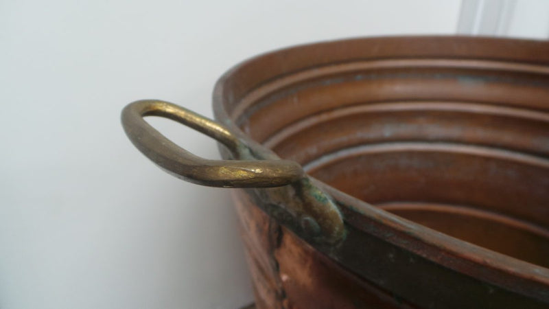 A fabulous French rustic antique copper and brass two handled bucket. Has loads of character and would make a great bucket for firewood. It is in very good original condition