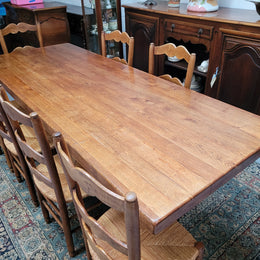 French Farmhouse table with a beautiful thick plank top and stretcher base. Can seat 8-10 people comfortably and is in good original detailed condition.