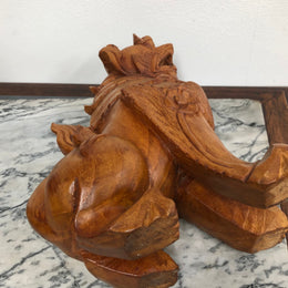 Chinese carved Teak Foo dog with very good detail. In good original condition.