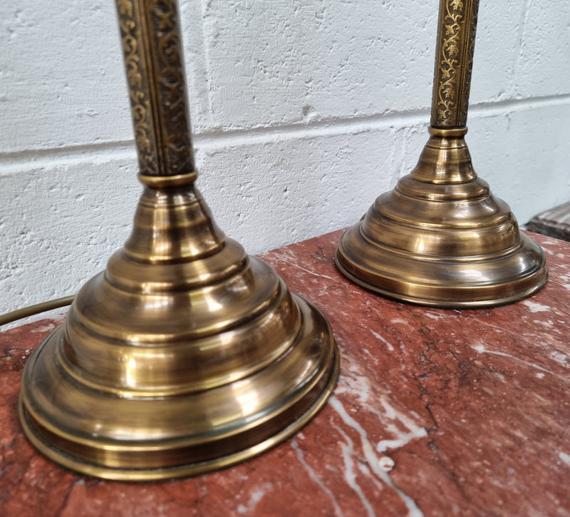 Pair of tall Antique style table lamps with glass floral etched shades. They have been sourced locally and are in good original detailed working condition.