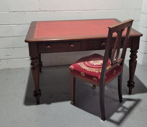 Victorian Cedar two drawer tooled leather topped desk with turned legs. In good original condition.