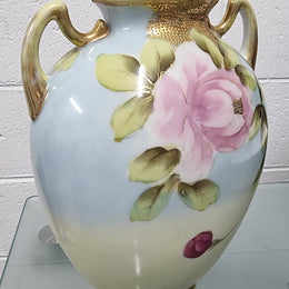 Lovely hand painted double handled vase in great original condition. Please see photos as it forms part of the description.