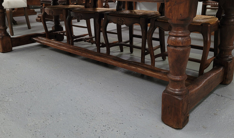 Amazing 2.65 meter French Elm Refectory dining table with loads of rustic charm. This table has been sourced from France and can comfortably seat ten people. It is in good original detailed condition.
