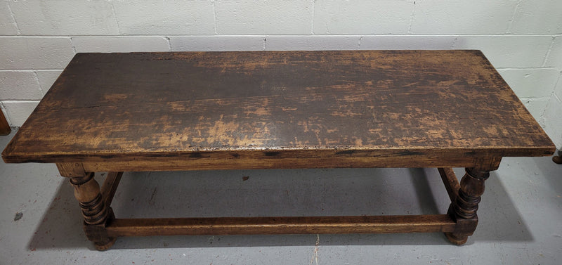 Hard to find longer then usual lovely rustic oak coffee table on turned legs. In good original detailed condition.