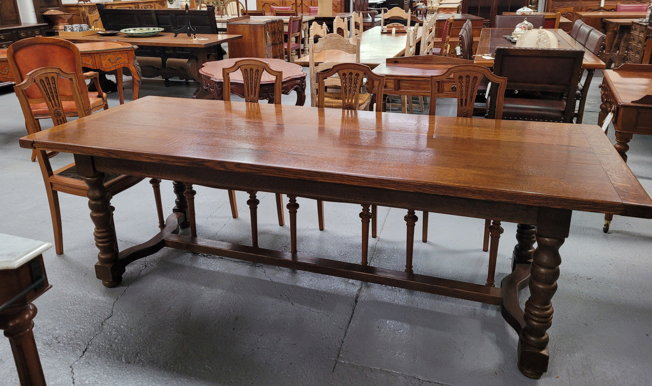 Amazing French Oak stretcher base Farmhouse table. It can comfortably sit eight people and is in good original detailed condition.