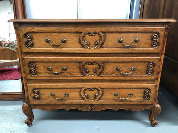 French nicely carved Oak chest of three drawers. In good original detailed condition.