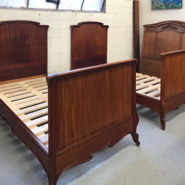 Rare French king single walnut bed, circa 1900. In good original condition. We currently have two matching kind single beds but they are being sold separately.