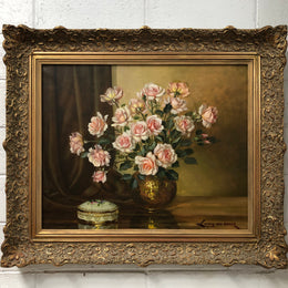 Large French signed oil on canvas of flowers. From circa 1950s and is in good original condition.