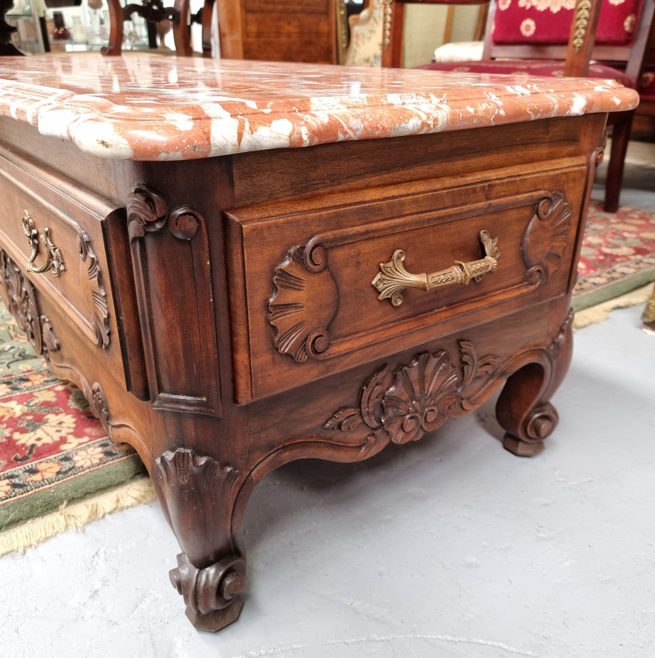Amazing original walnut Louis XV style coffee table with a marble top, one drawer on either end and a faux drawer at the front. In good original detailed condition, sourced in France.