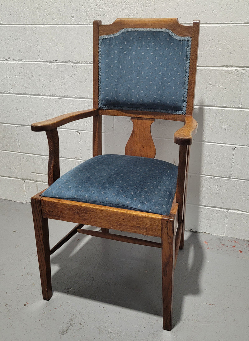 Arts and crafts style blue upholstered armchair. In good original detailed condition.