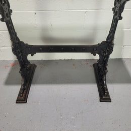 Late Victorian English Mahogany and cast iron base pub table. The foundry maker name is on the base and it is in good original detailed condition.