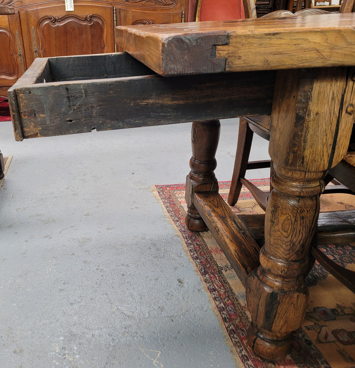Large impressive 19th century 2.5 meter Antique French Oak farmhouse table. Loads of character with a stunning solid thick top and has a long drawer at one end. Sourced from France and in good original detailed condition.