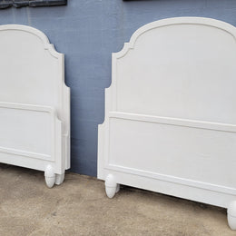 Two attractive vintage French chalk painted king single Art Deco beds. They have been sourced from France and are in good original condition.