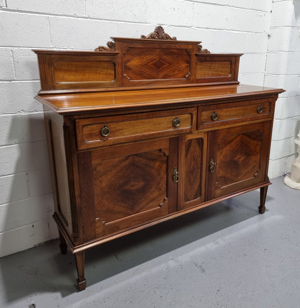 Fabulous Antique two door Blackwood and Fiddleback sideboard with lovely pressence and also plenty of room for storage. In original detailed condition.