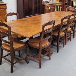 Amazing French Oak Renaissance style parquetry top extension table. Beautiful parquetry top and amazing detailed carvings on the legs. It extends to 306 cm long when fully extended. Sourced from France and in good original detailed condition.