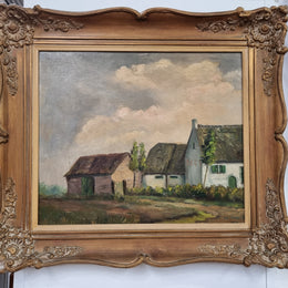 French signed oil on canvas depicting farmhouse in a lovely gilt frame. It is in good original detailed condition and has been sourced from France.