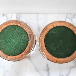 Gorgeous pair of vintage silver plate wine coasters with stunning turned wooden base. Not marked. In great original condition.