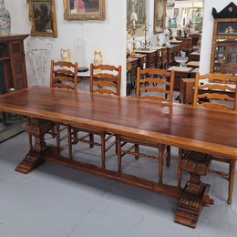 French style reclaimed Elm Farmhouse table with stretcher base and amazing carving underneath. Table can sit 10-12 people and is in good original detailed condition.