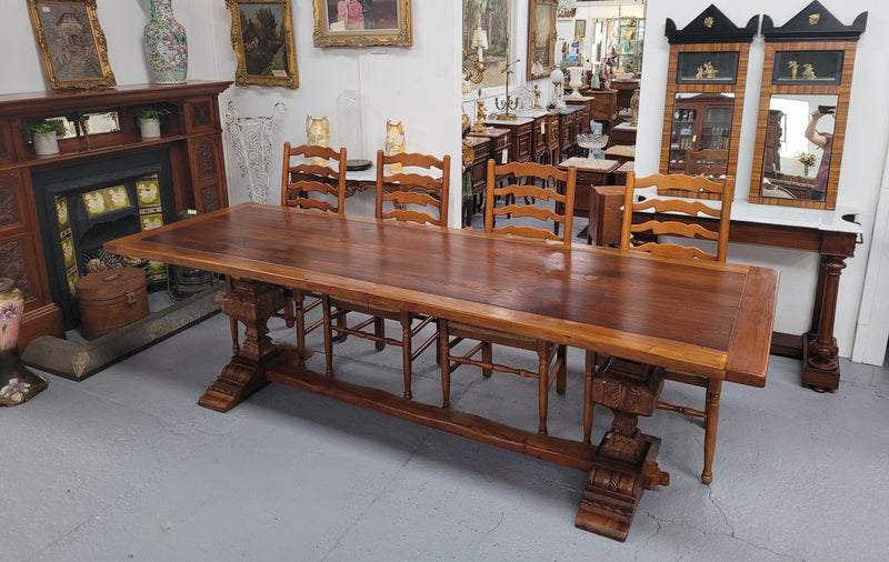French style reclaimed Elm Farmhouse table with stretcher base and amazing carving underneath. Table can sit 10-12 people and is in good original detailed condition.