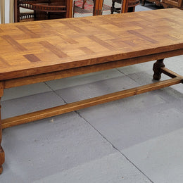 French Oak Refectory dining table with a parquetry top. Sourced from France this table comfortably sits eight to ten. It is in good original detailed condition.